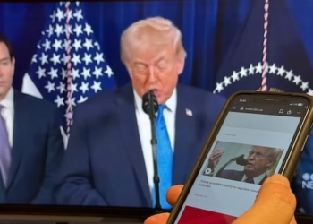 Trump on a TV screen and a phone