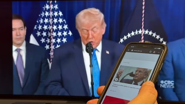 Trump on a TV screen and a phone
