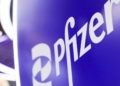 Pfizer says experimental breast cancer drug cuts risk of disease worsening in mid-stage trial