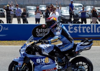 Alex Marquez wins Spanish Grand Prix while brother Marc crashes out