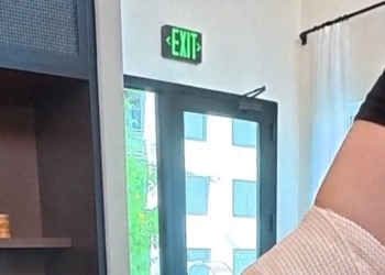 Arizona woman says she was hospitalized after tattoo