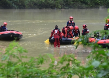 At least nine killed in southwest China after truck falls into river in heavy rain