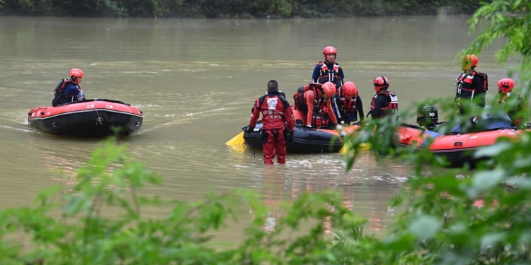 At least nine killed in southwest China after truck falls into river in heavy rain